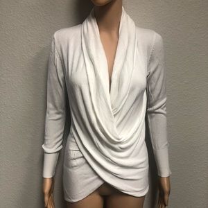 Woman’s bebe light fitted sweater. Size small